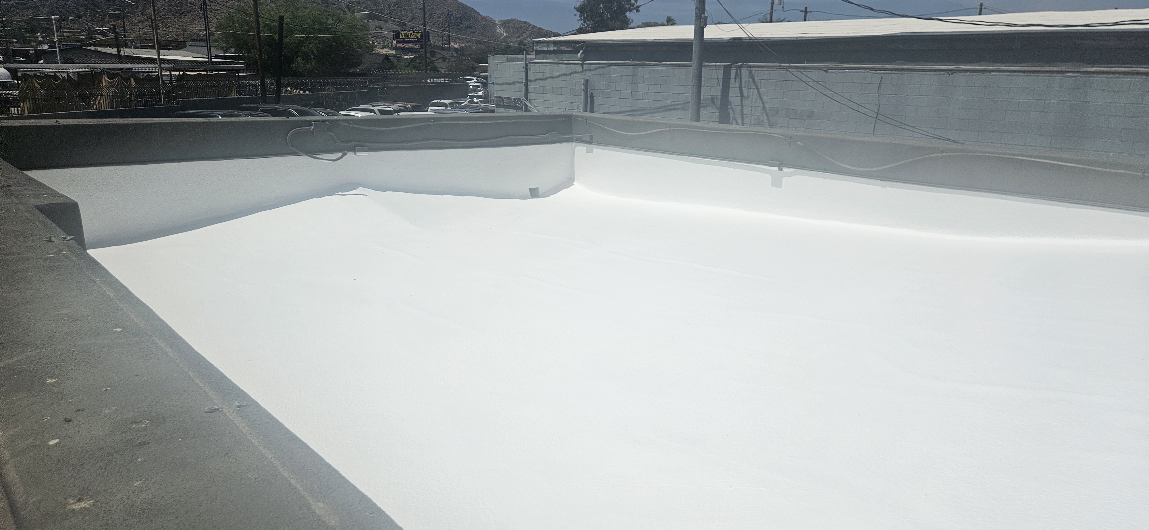 Silicone vs Elastomeric Roof Coating for Arizona Foam Roofs