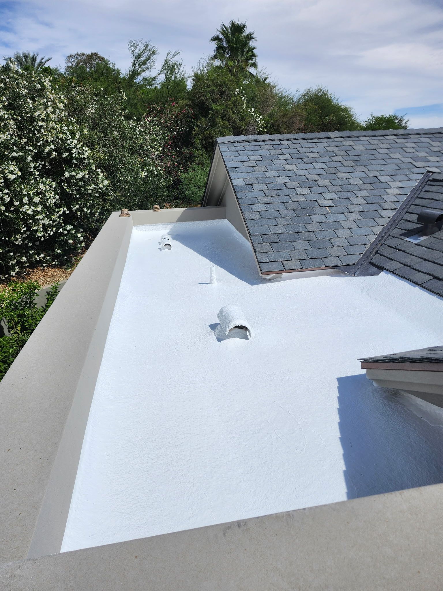Detailed view of foam roof recoating service for Phoenix homes.
