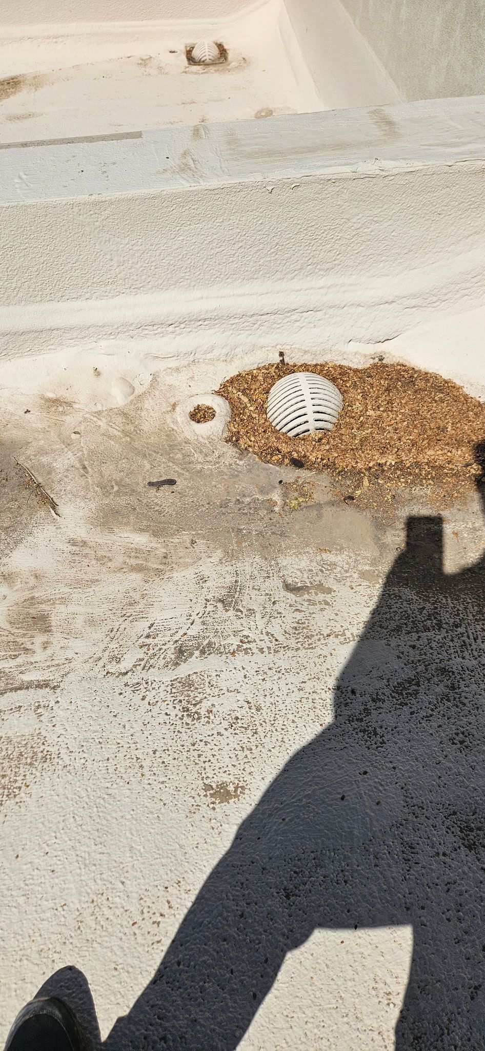 Durafoam Roofing detail of foam flat roof inspection in Scottsdale, Arizona.
