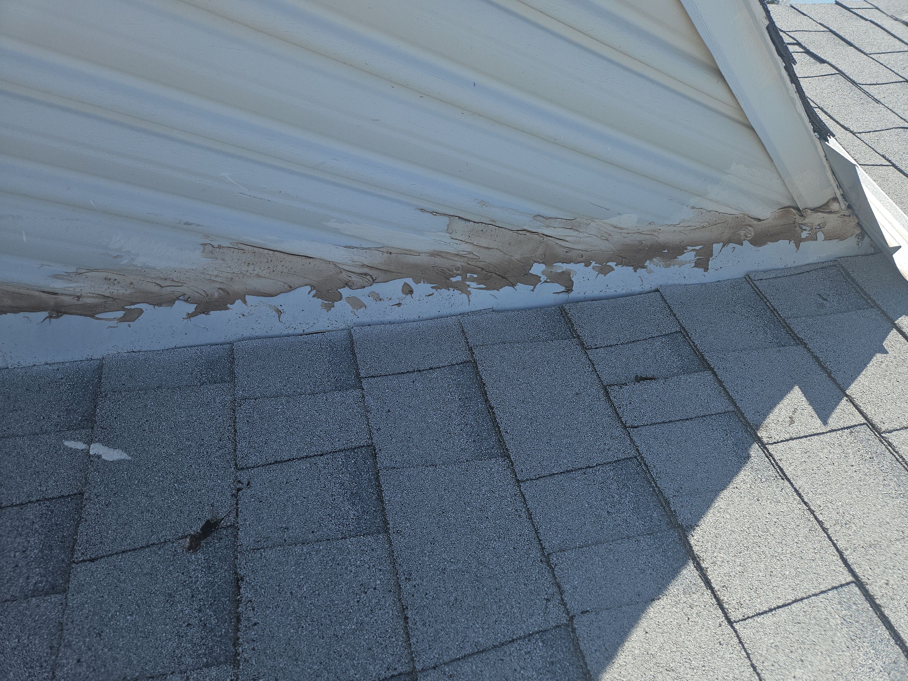 Close-up of a residential shingle roof repair in Phoenix.