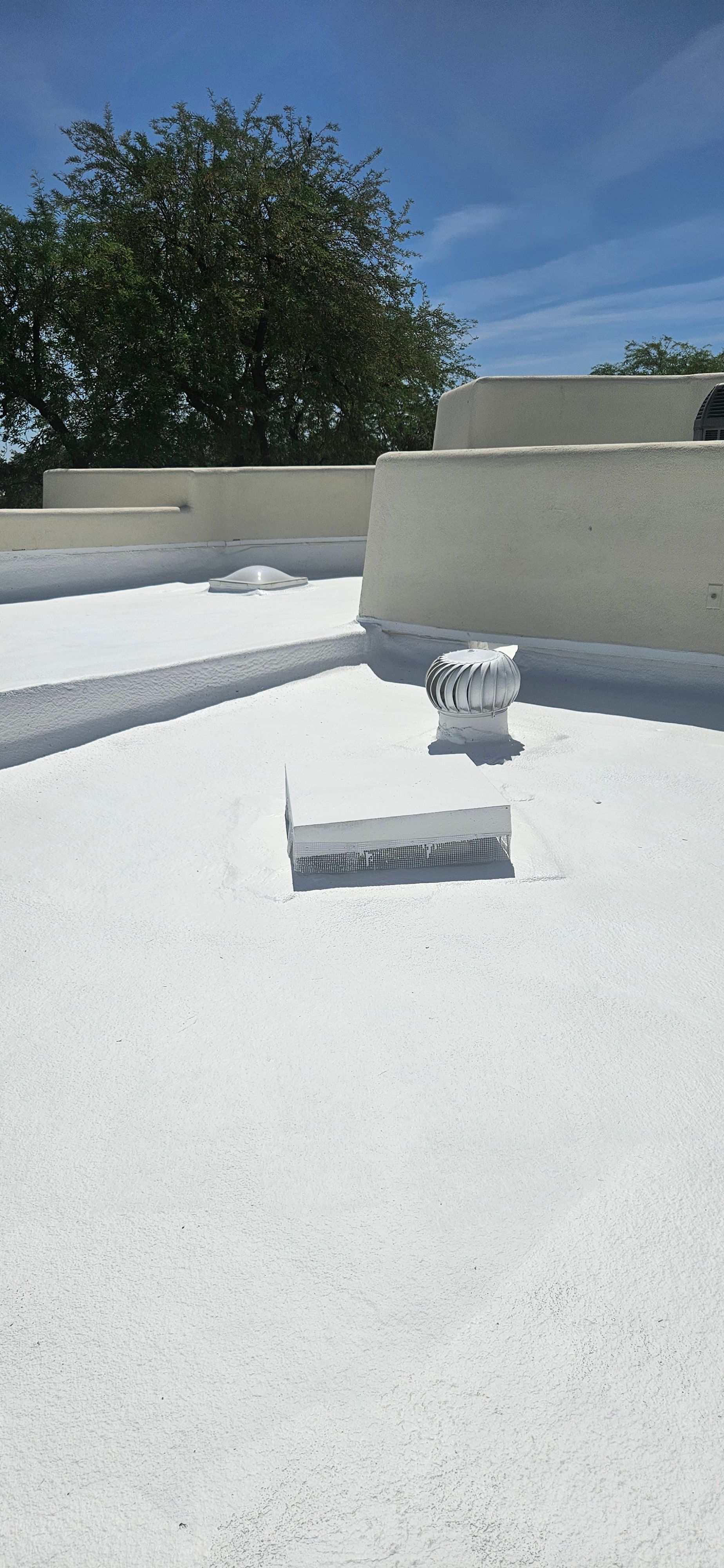 Close-up detail of foam roof recoating for Paradise Valley homes by Durafoam Roofing.